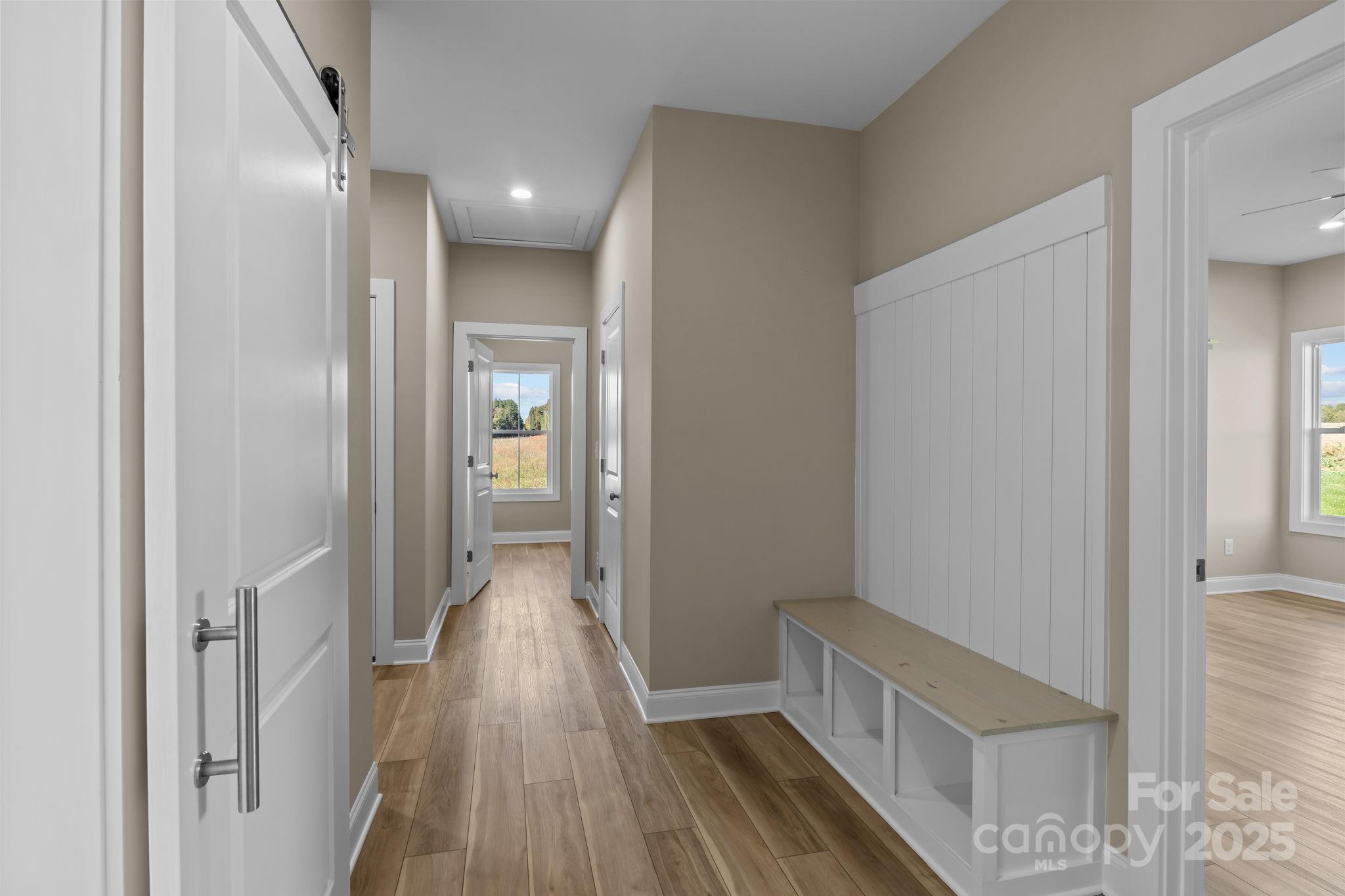 1716 Jennings Road Olin, NC 28660 - Photo 26 of 48 a view of a hallway with wooden floor