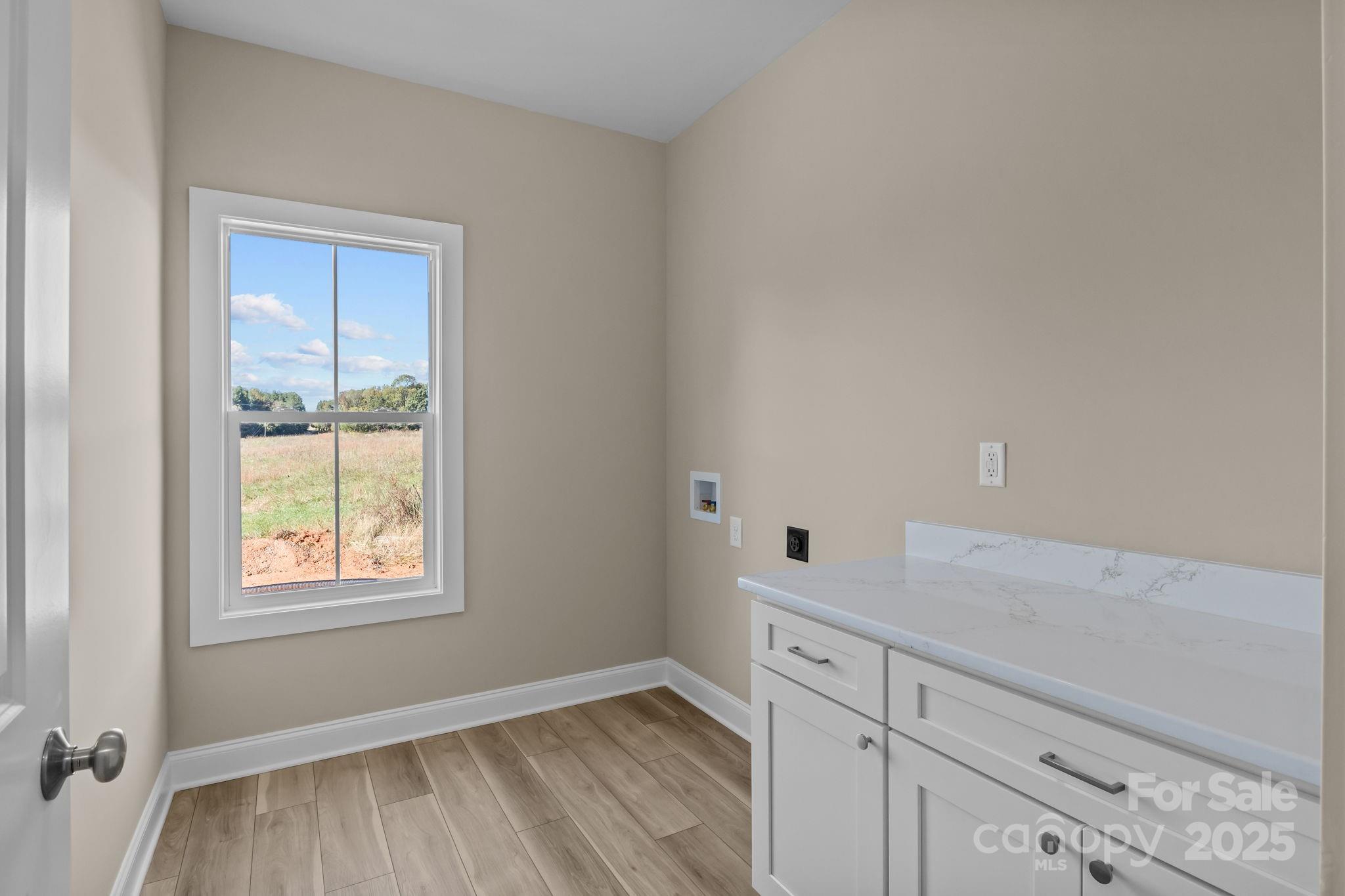 1716 Jennings Road Olin, NC 28660 - Photo 27 of 48 a view of cabinets and window