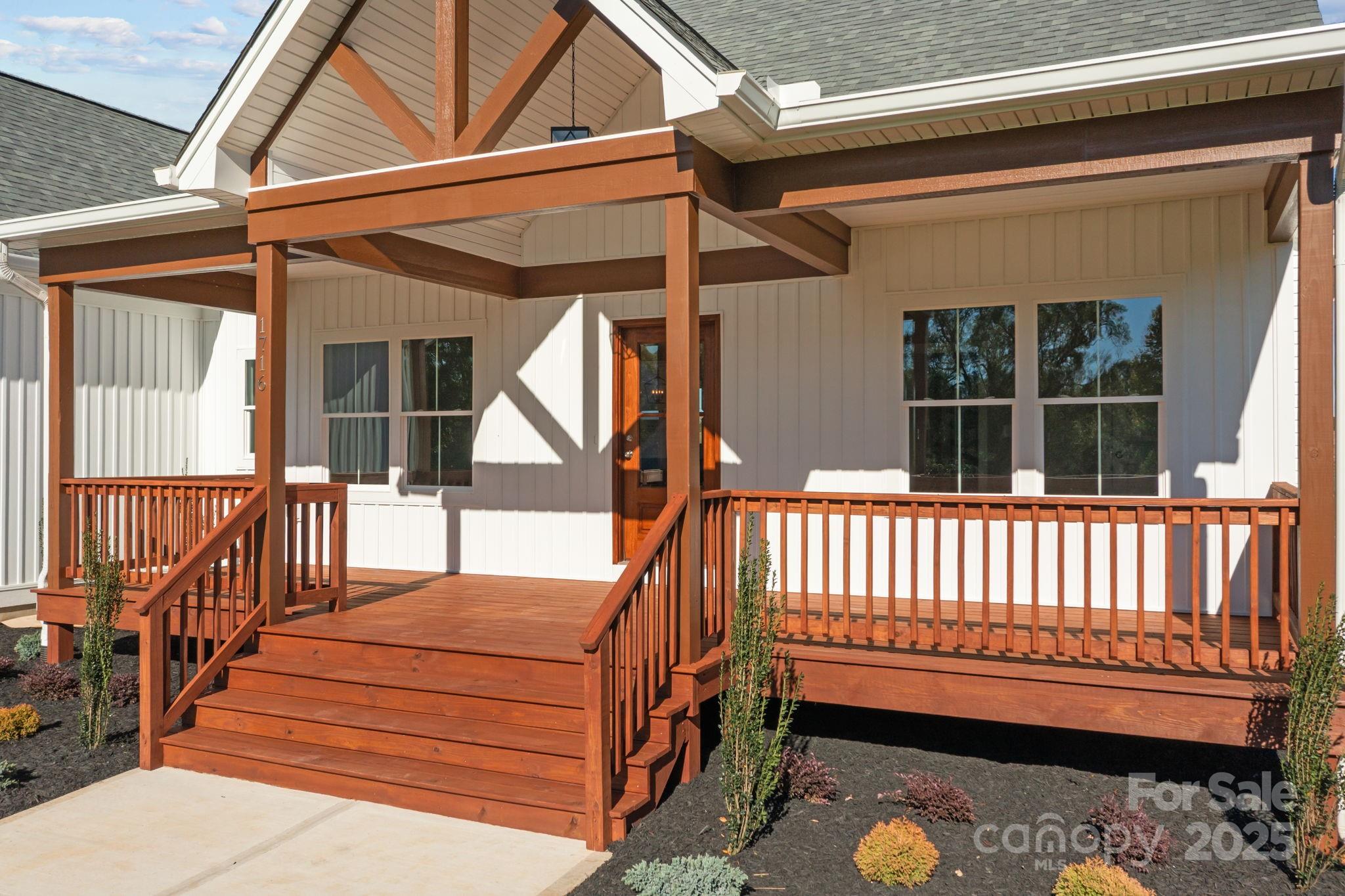 1716 Jennings Road Olin, NC 28660 - Photo 3 of 48 a view of a backyard with a deck