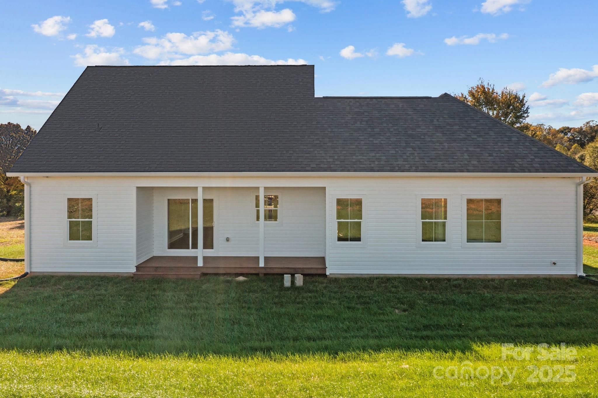 1716 Jennings Road Olin, NC 28660 - Photo 38 of 48 a front view of house with yard