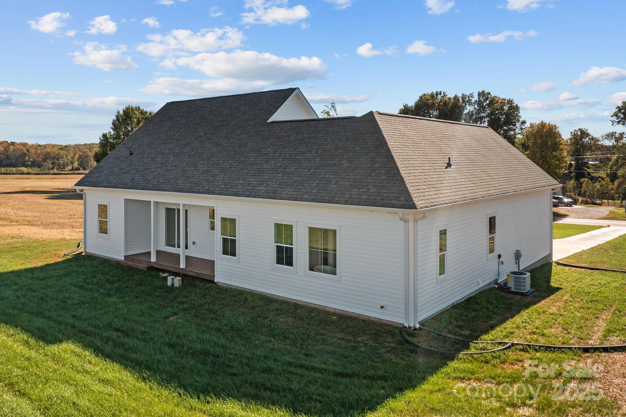 1716 Jennings Road Olin, NC 28660 - Photo 40 of 48 a view of a house with a yard