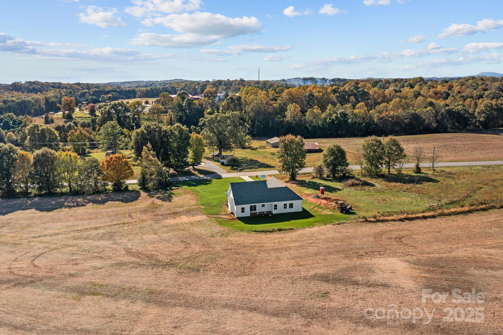 1716 Jennings Road Olin, NC 28660 - Photo 47 of 48 a view of a terrace with a bench