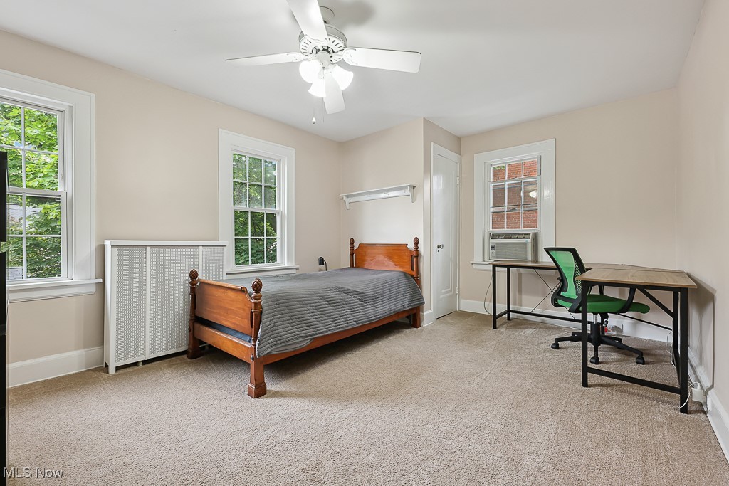 3266 Avalon Road Cleveland, OH 44120 - Photo 34 of 46 Carpeted bedroom featuring multiple windows and a ceiling fan