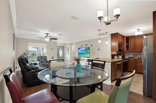 a view of a dining room with furniture