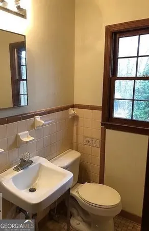 a bathroom with a sink and a toilet