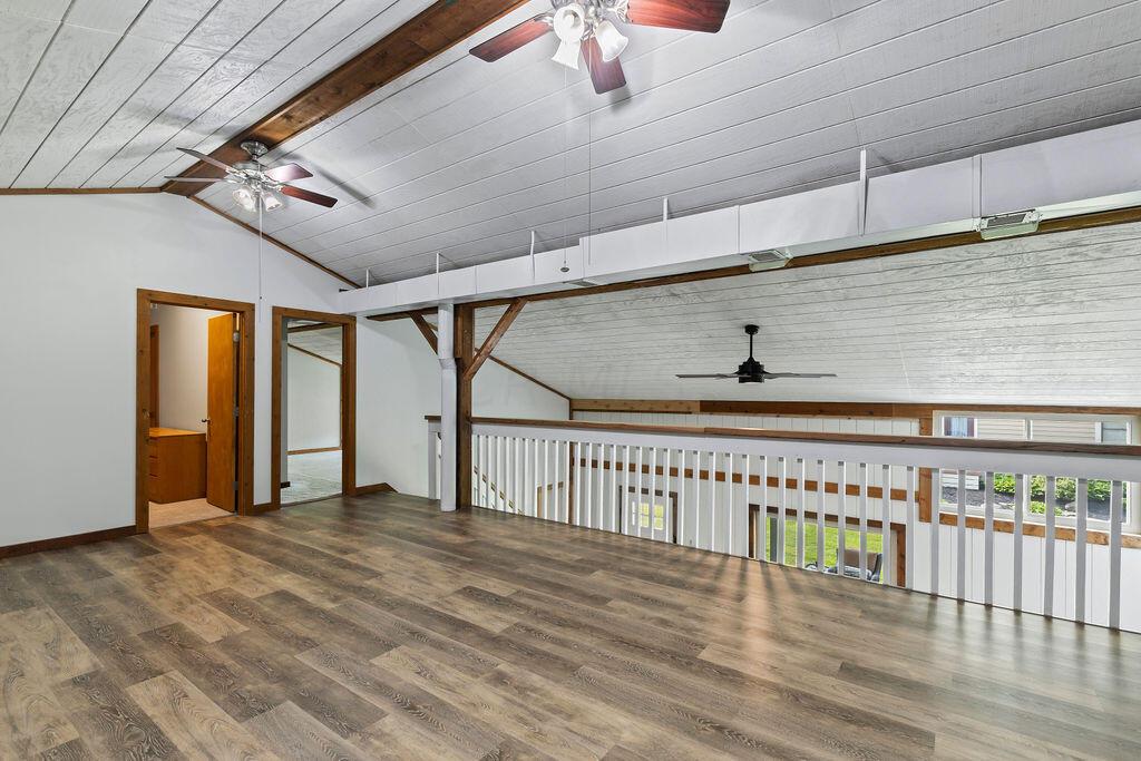 10389 Center Village Road, Unit A Galena, OH 43021 - Photo 26 of 39 view from NW corner of loft toward the office & bedroom 2 & top of stairs & loft railing