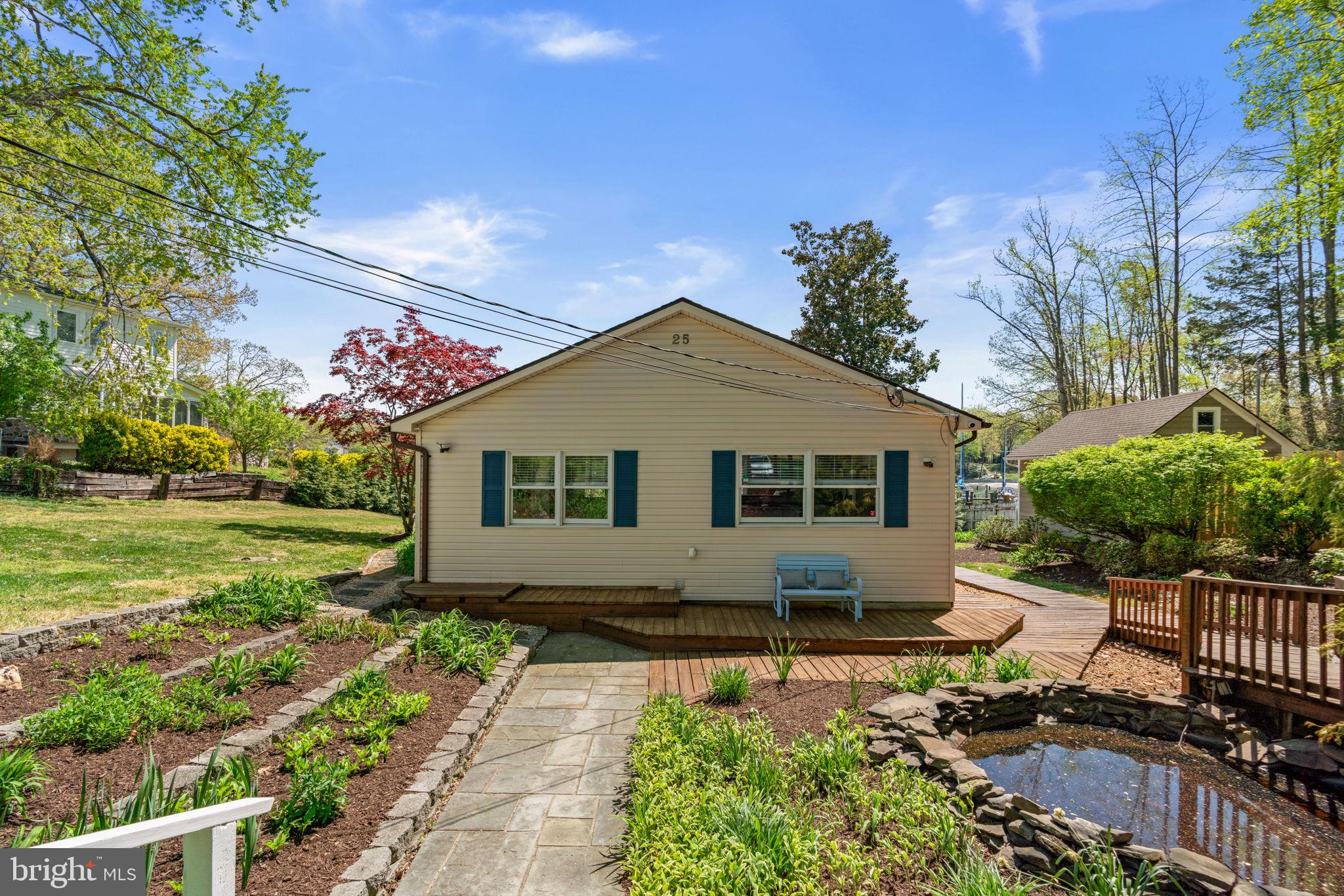 25 Leeland Road Edgewater, MD 21037 - Photo 47 of 48 a front view of house with yard and green space