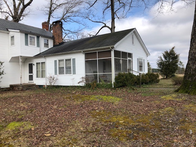 5513 Cox Road Wilsons, VA 23894 - Photo 4 of 10 a view of a house with a yard