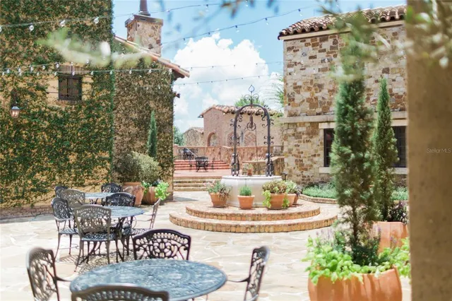 a view of a fountain in the middle of a city
