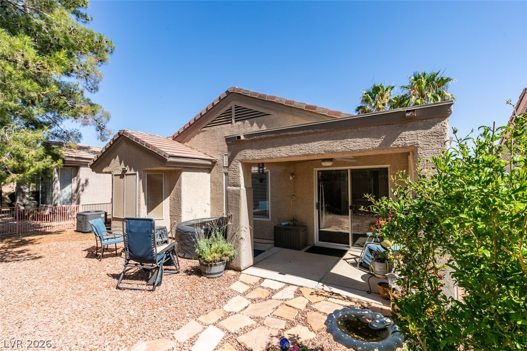 2187 Chapman Ranch Drive Henderson, NV 89012 - Photo 23 of 26 This charming property features a private yard with a covered patio, perfect for outdoor enjoyment.