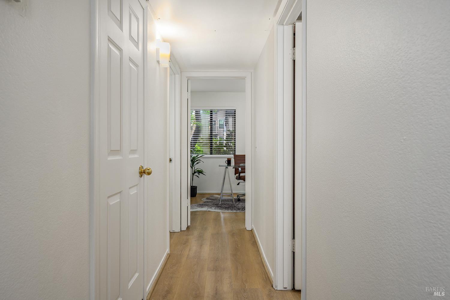 425 Mission Boulevard Santa Rosa, CA 95409 - Photo 16 of 29 Hallway leading to Laundry on the left, bathroom on the right and 2nd bedroom straight ahead