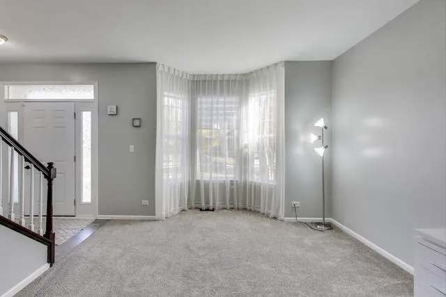 a view of an entryway with a flower pot