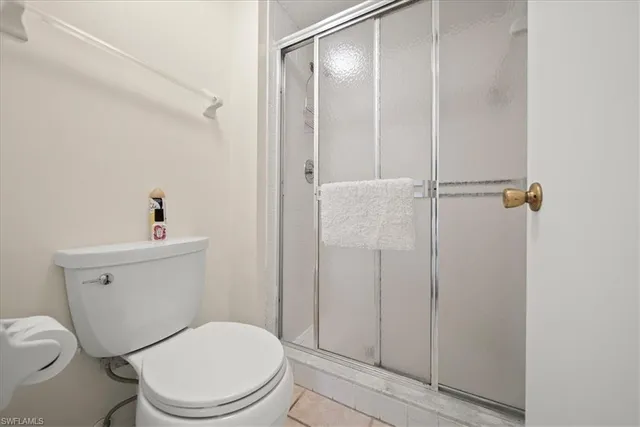 a bathroom with a granite countertop sink mirror and double