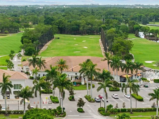 an aerial view of a house having fountain