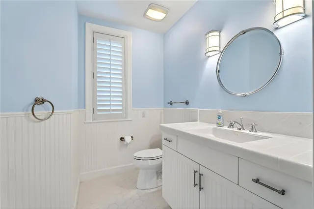 an empty room with windows and entrance