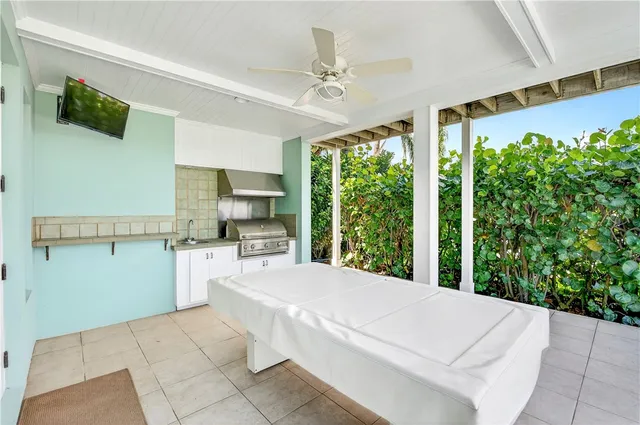 a view of a lake with a garden and swimming pool