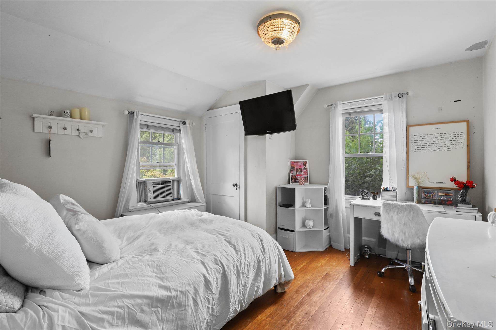 16 Annadale Street Armonk, NY 10504 - Photo 12 of 19 a bedroom with a bed and a chair