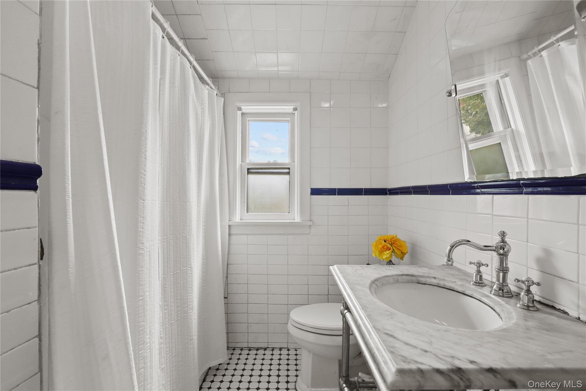 16 Annadale Street Armonk, NY 10504 - Photo 13 of 19 a bathroom with a sink toilet and shower