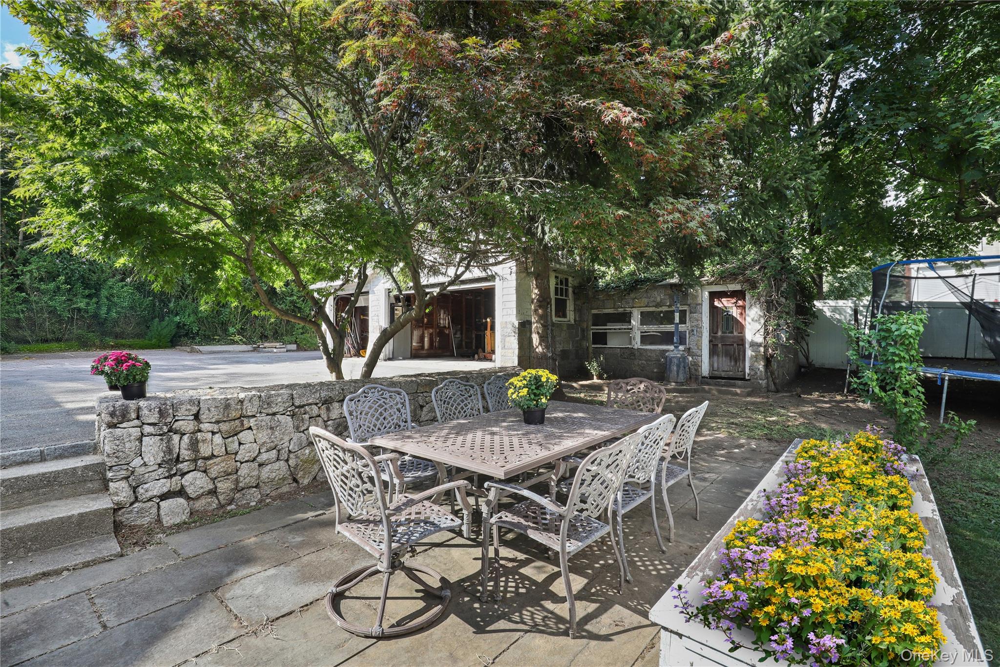 16 Annadale Street Armonk, NY 10504 - Photo 15 of 19 a view of backyard with swimming pool and patio