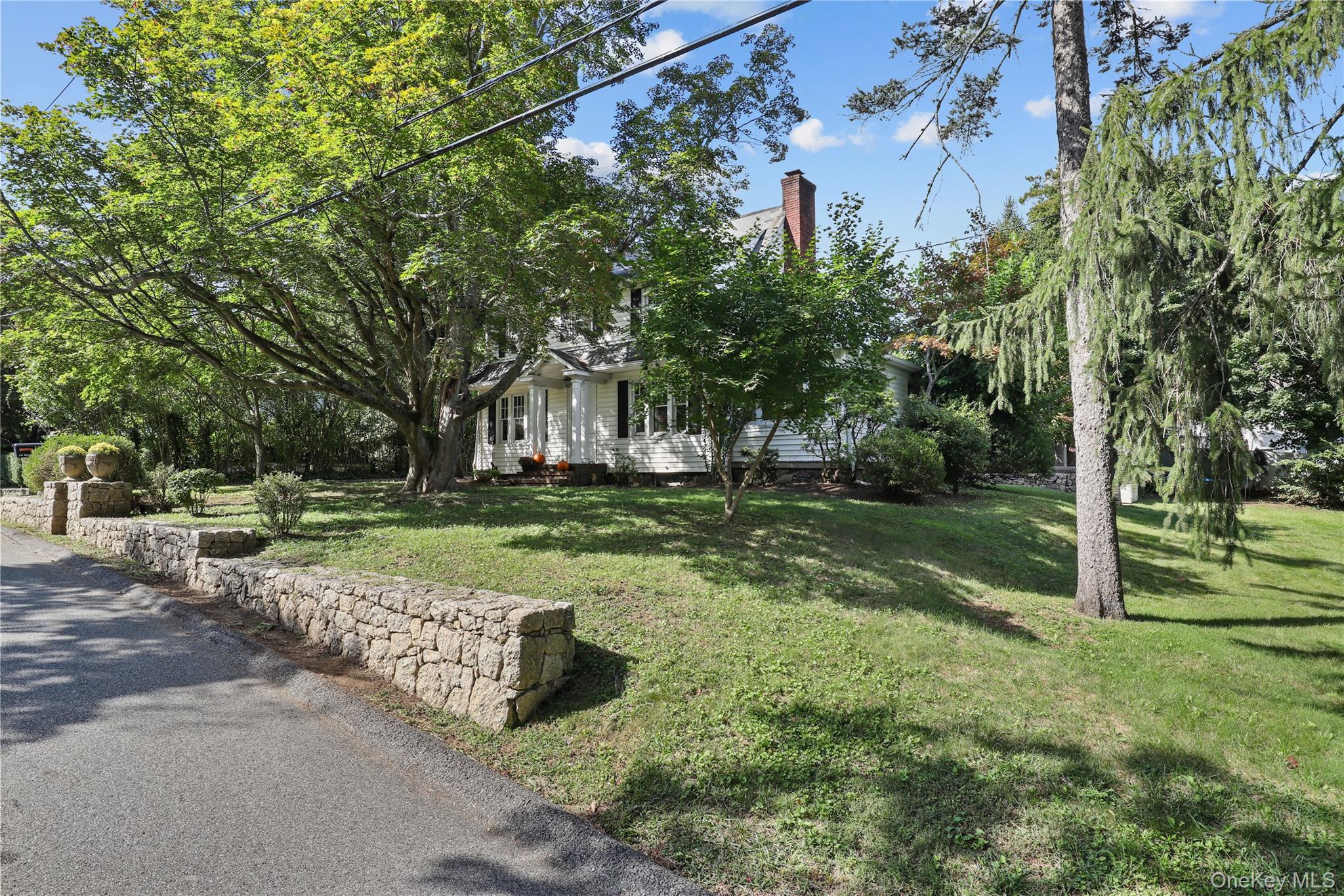 16 Annadale Street Armonk, NY 10504 - Photo 17 of 19 a view of a park with large trees
