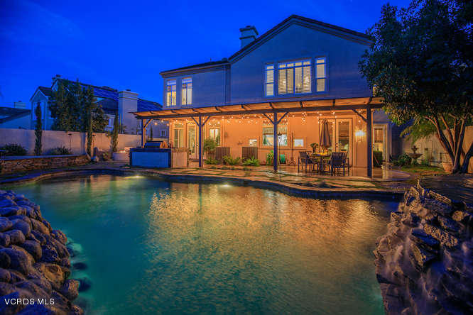 a view of a house with swimming pool