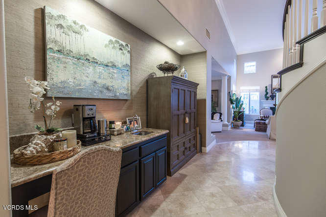 4145 Laurelview Drive Moorpark, CA 93021 - Photo 16 of 55 a kitchen with stainless steel appliances kitchen island granite countertop a refrigerator and a stove