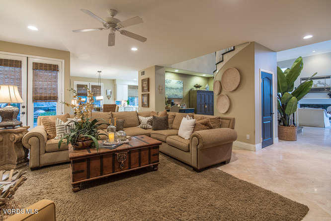 4145 Laurelview Drive Moorpark, CA 93021 - Photo 17 of 55 a living room with furniture ceiling fan and a rug