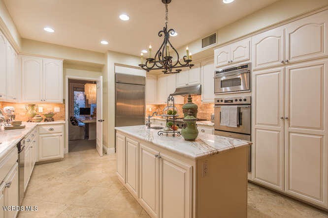 4145 Laurelview Drive Moorpark, CA 93021 - Photo 22 of 55 a kitchen with stainless steel appliances granite countertop a refrigerator and a sink