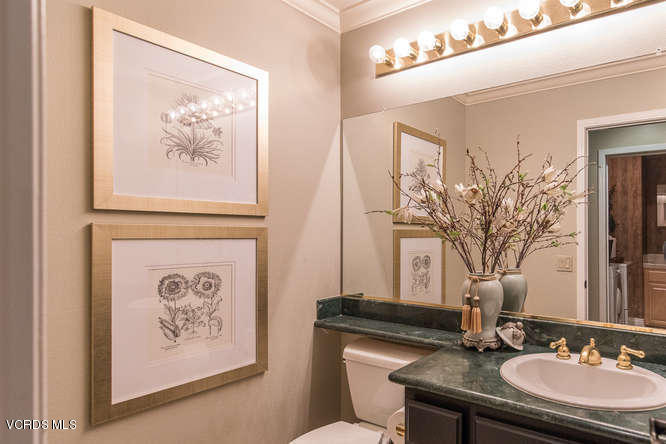 4145 Laurelview Drive Moorpark, CA 93021 - Photo 26 of 55 a bathroom with a sink a toilet and a mirror