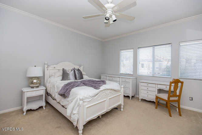 4145 Laurelview Drive Moorpark, CA 93021 - Photo 34 of 55 a bed room with a bed and a chair