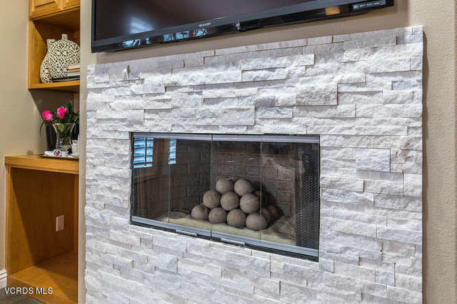 4145 Laurelview Drive Moorpark, CA 93021 - Photo 38 of 55 a room with a fireplace and a potted plant