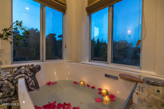 4145 Laurelview Drive Moorpark, CA 93021 - Photo 42 of 55 a bathroom with a tub and shower