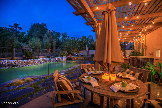 4145 Laurelview Drive Moorpark, CA 93021 - Photo 48 of 55 a view of a chairs and table in patio with a lake view