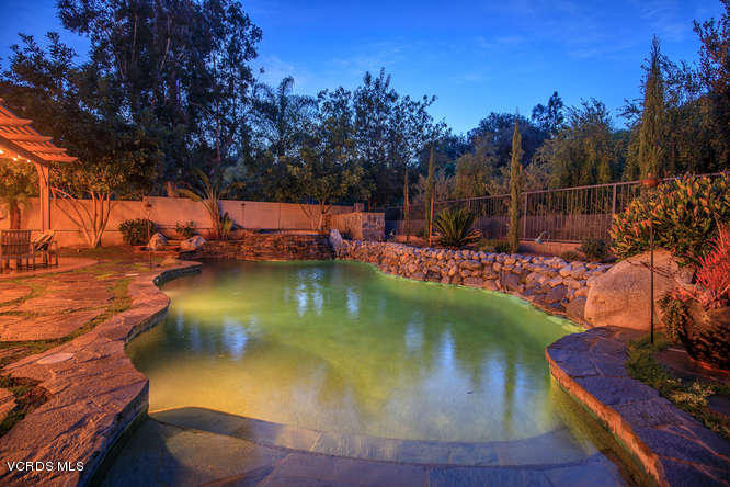 4145 Laurelview Drive Moorpark, CA 93021 - Photo 52 of 55 a view of a lake with a house in the background