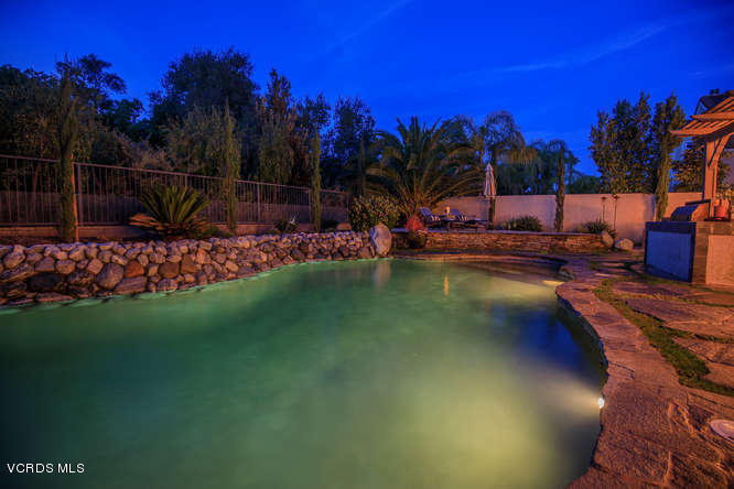 4145 Laurelview Drive Moorpark, CA 93021 - Photo 54 of 55 a view of a swimming pool with an outdoor space and seating area