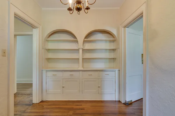 a view of a livingroom with wooden floor