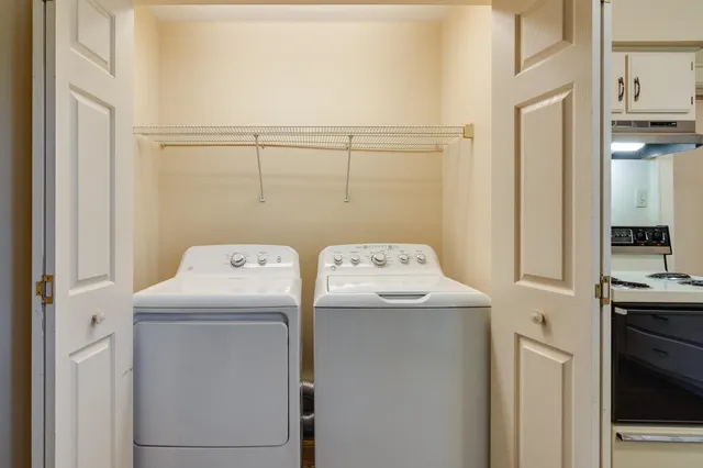 a utility room with dryer and washer