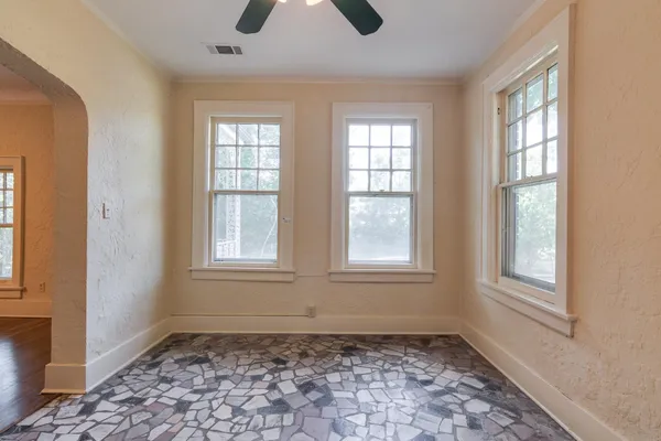 an empty room with windows