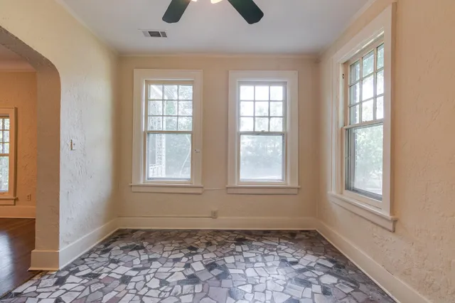 an empty room with windows