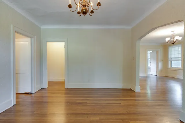a view of a livingroom with wooden floor