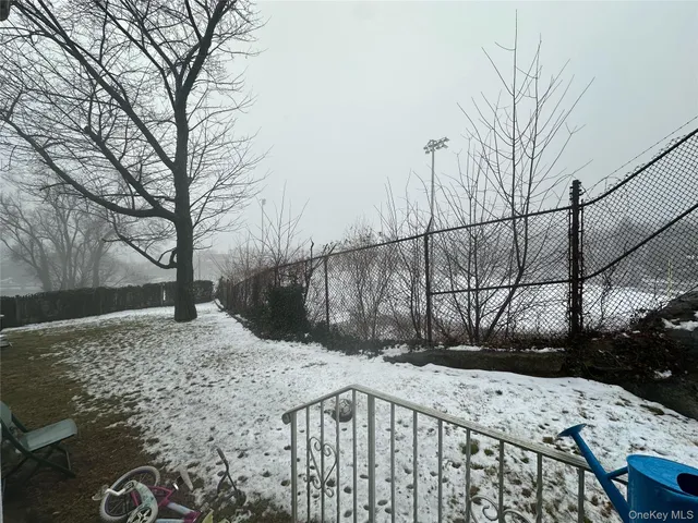 a view of a backyard with a snow