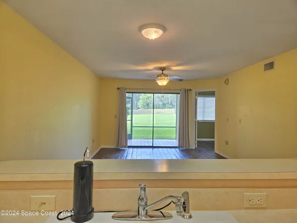 a view of a room with windows