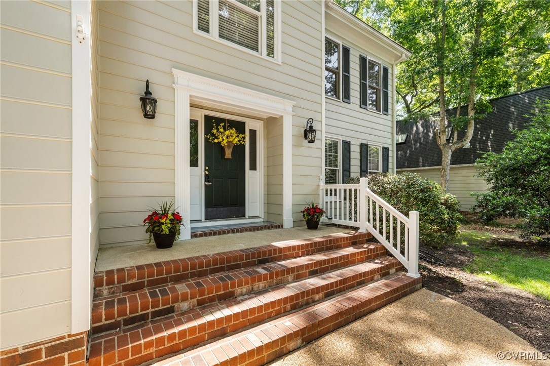 15210 Powell Grove Road Midlothian, VA 23112 - Photo 2 of 36 a view of a house with backyard and porch