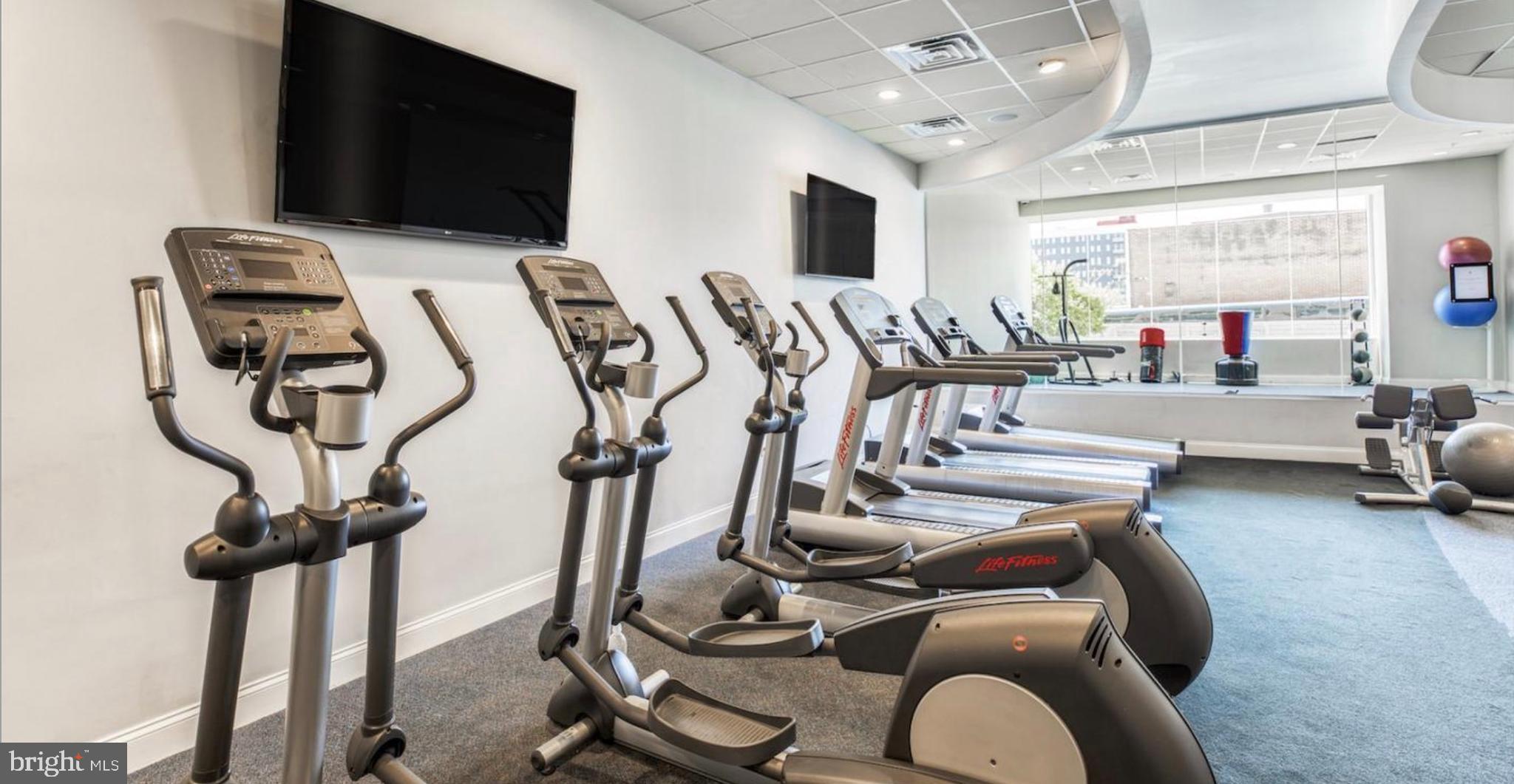 1 Brown Street, Unit 2B2BA Philadelphia, PA 19123 - Photo 4 of 29 a view of a room with gym equipment