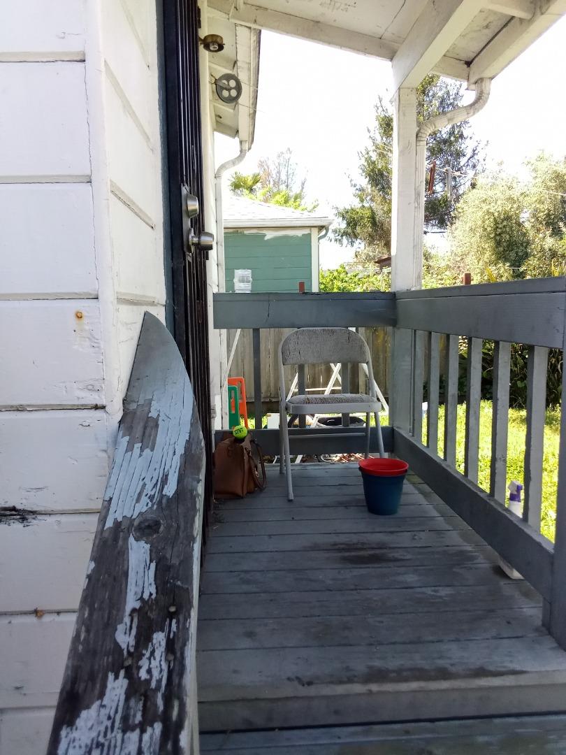 1211 Russell Street Berkeley, CA 94702 - Photo 6 of 15 a dining room with furniture and a floor to ceiling window