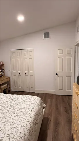 a view of a livingroom with wooden floor