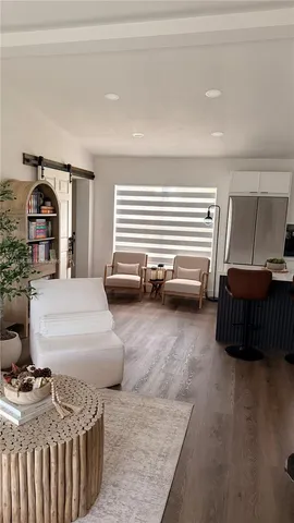 a bedroom with a bed and a view of bedroom