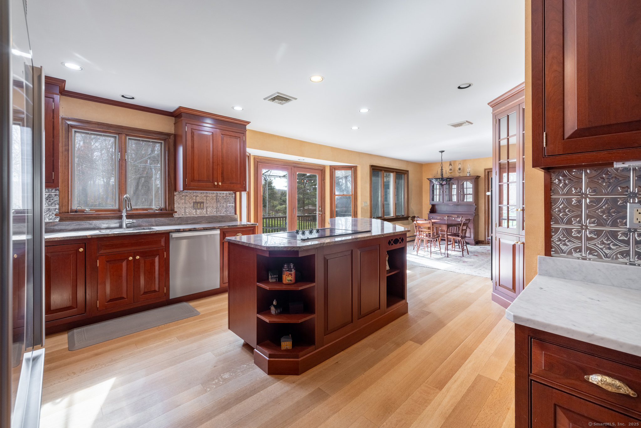 38 Barnhill Road Woodbury, CT 06798 - Photo 6 of 23 Oversized kitchen with island, plenty of cabinetry.