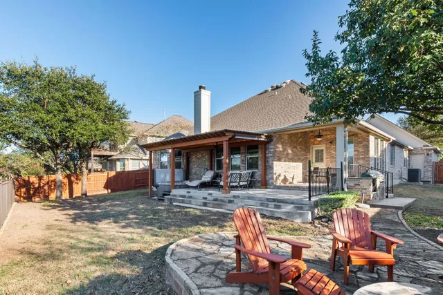 a view of a table and chairs in patio