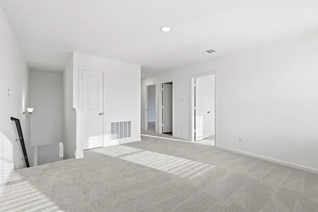 a bathroom with a shower and a toilet